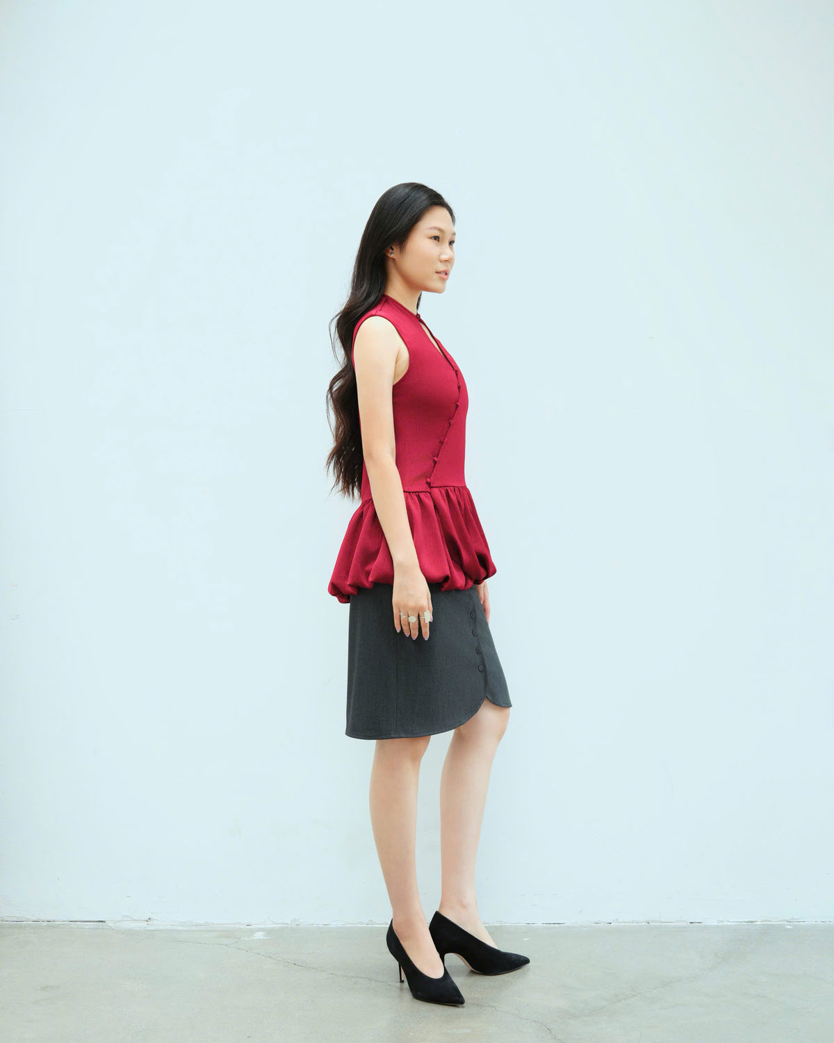 Woman in Building Skirt