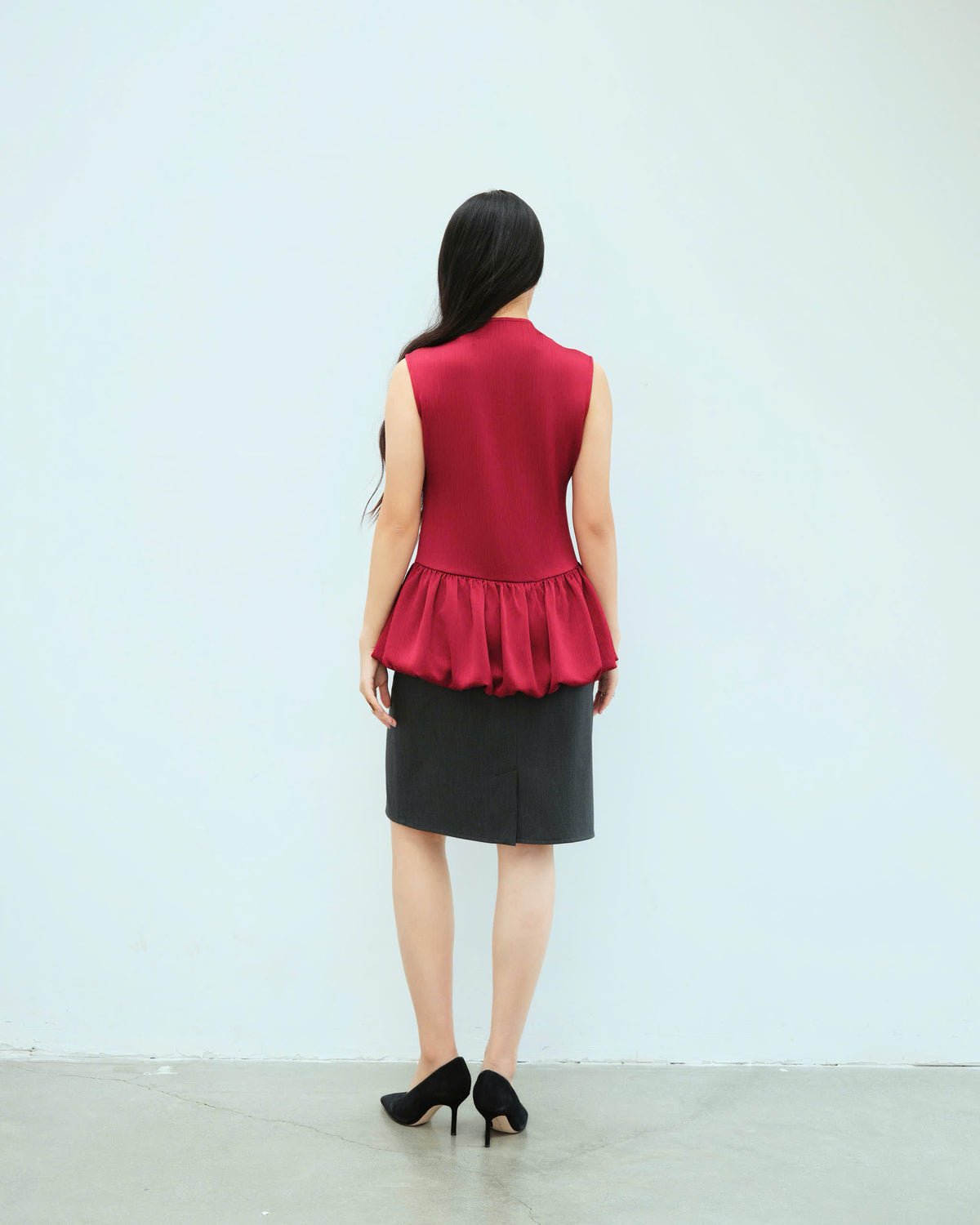 Woman in Building Skirt
